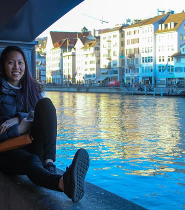 Female UCR student posing by water in Copenhagen